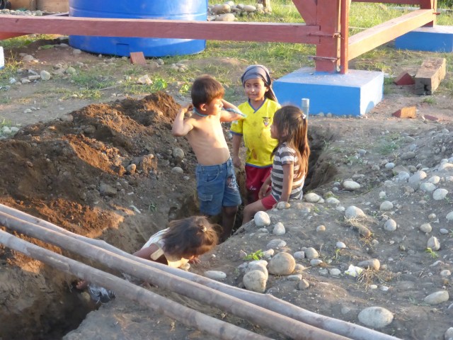 Children playing at the work site